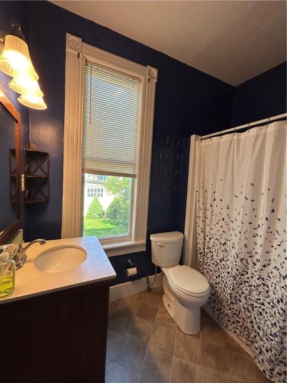411 Cherry St, City Of But Ne, PA 16001 - bathroom with vanity, a shower with shower curtain, and tile patterned floors