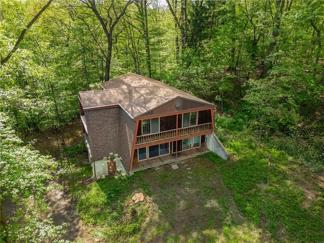 1445 E Cruikshank Rd, Valencia Boro, PA 16059 - back of property with a view of trees, a shingled roof, and a deck