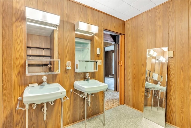 1445 E Cruikshank Rd, Valencia Boro, PA 16059 - bathroom featuring wood walls and a baseboard heating unit