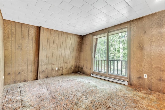 1445 E Cruikshank Rd, Valencia Boro, PA 16059 - carpeted spare room with baseboard heating and wooden walls