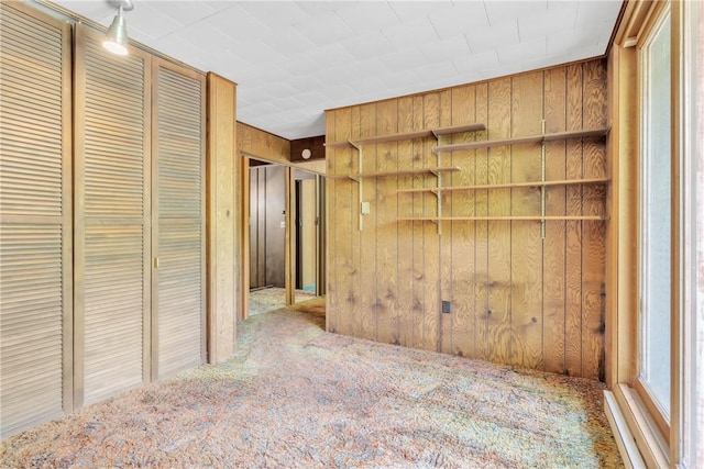 1445 E Cruikshank Rd, Valencia Boro, PA 16059 - unfurnished bedroom featuring carpet floors and wooden walls