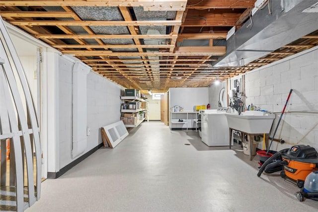 7134 Roycrest Pl, Point Breeze, PA 15208 - unfinished basement featuring separate washer and dryer and concrete block wall