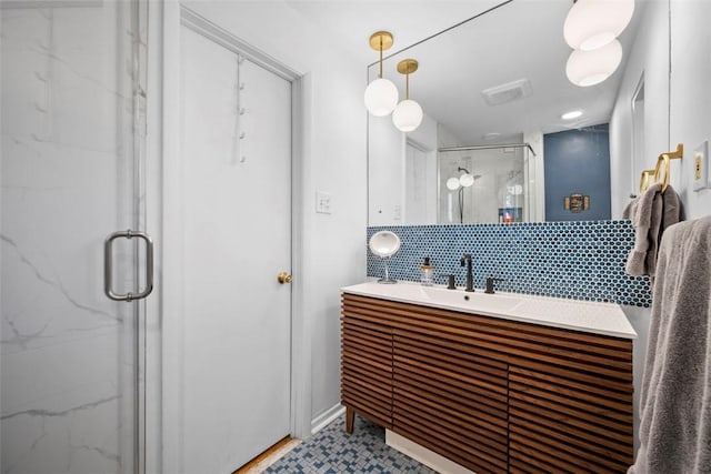 7134 Roycrest Pl, Point Breeze, PA 15208 - bathroom featuring a marble finish shower, decorative backsplash, and vanity