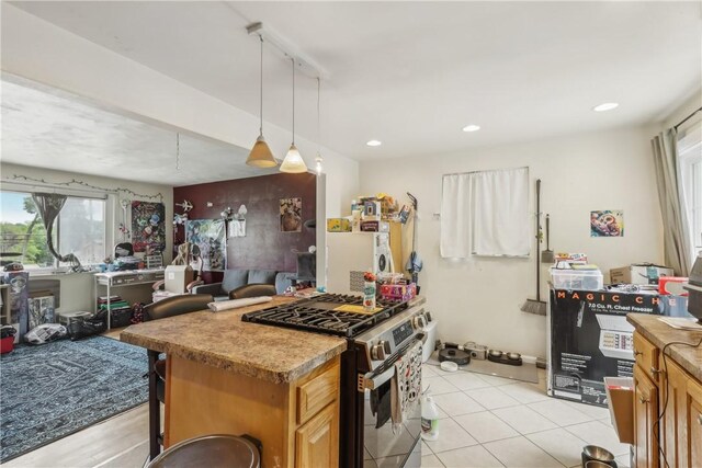 142 Meadowbrook Dr, Moon/Crescent Twp, PA 15108 - kitchen featuring stainless steel gas range oven, pendant lighting, open floor plan, recessed lighting, and light countertops
