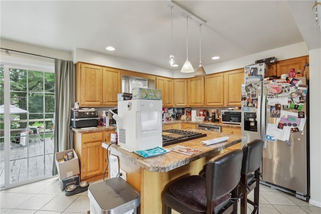 142 Meadowbrook Dr, Moon/Crescent Twp, PA 15108 - kitchen with appliances with stainless steel finishes, light tile patterned floors, light countertops, a kitchen island, and recessed lighting