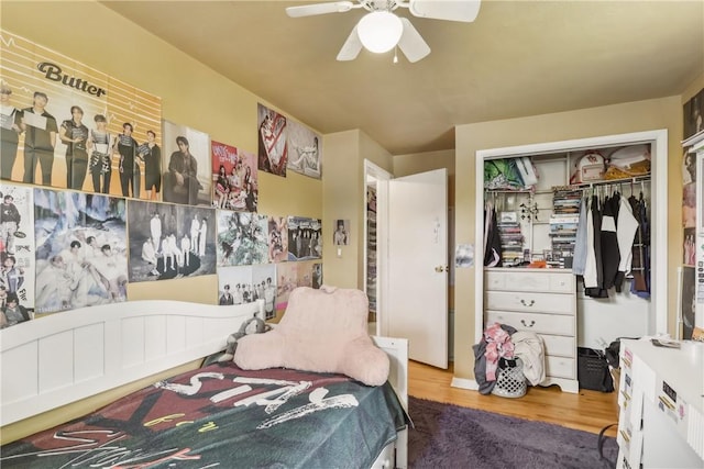 142 Meadowbrook Dr, Moon/Crescent Twp, PA 15108 - bedroom with a closet, wood finished floors, and ceiling fan