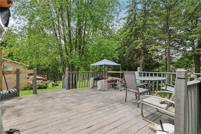 142 Meadowbrook Dr, Moon/Crescent Twp, PA 15108 - wooden terrace with outdoor dining area and view of scattered trees