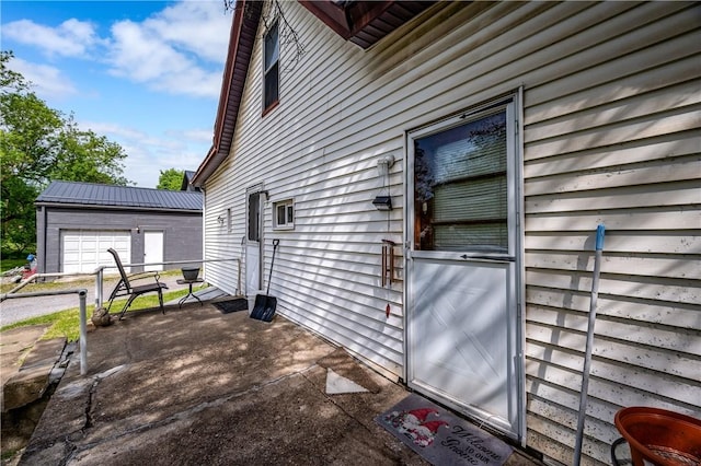 250 E Neshannock Ave, New Wilmington Boro, PA 16142 - view of side of property featuring an outbuilding and a garage