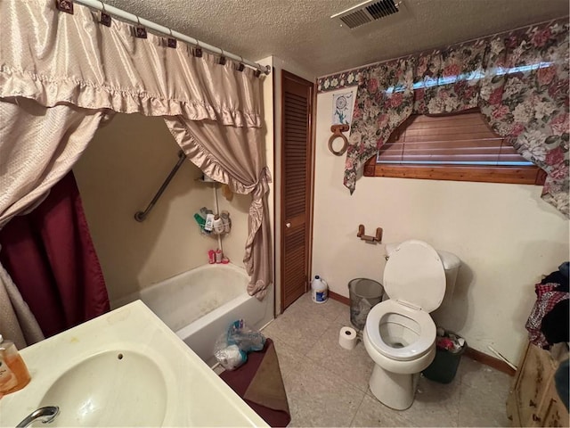 300 N Ave, Midway, PA 15060 - full bath with a textured ceiling, toilet, baseboards, tile patterned floors, and a sink