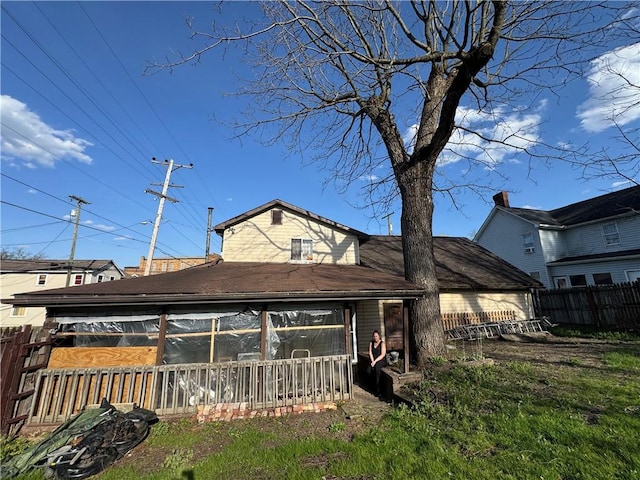 300 N Ave, Midway, PA 15060 - rear view of property featuring a sunroom
