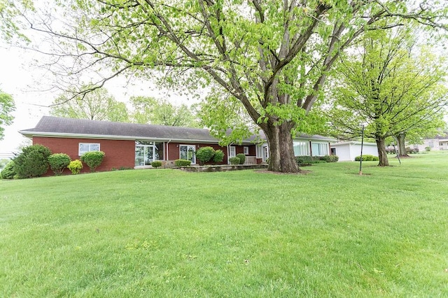302 Derrick Ave, South Union Twp, PA 15401 - ranch-style home featuring a front yard and brick siding