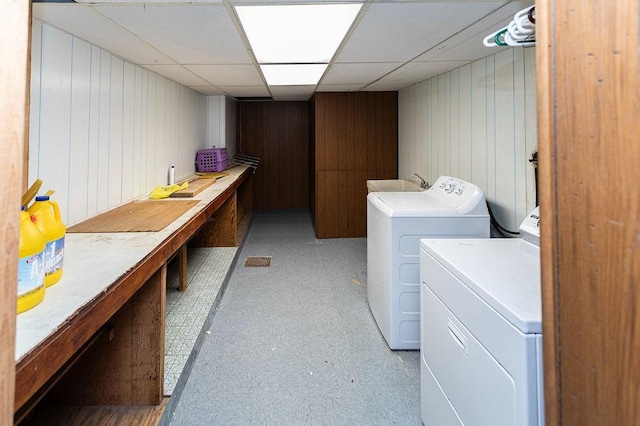 302 Derrick Ave, South Union Twp, PA 15401 - laundry area featuring independent washer and dryer, light flooring, a workshop area, and wood walls