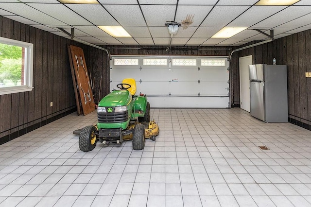 302 Derrick Ave, South Union Twp, PA 15401 - garage with freestanding refrigerator and wood walls