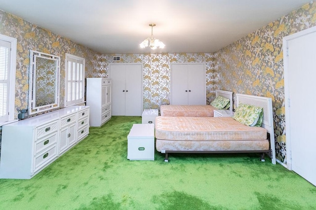 302 Derrick Ave, South Union Twp, PA 15401 - bedroom with a chandelier, wallpapered walls, and light colored carpet