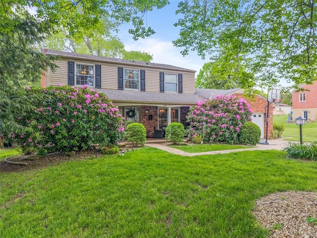 38 Elwyn Ave, Collier Twp, PA 15106 - traditional-style home with a front lawn and an attached garage