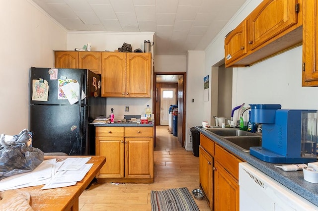 6071 Rte 711, Saint Clair Twp, PA 15944 - kitchen featuring freestanding refrigerator, white dishwasher, crown molding, light wood-style flooring, and brown cabinetry