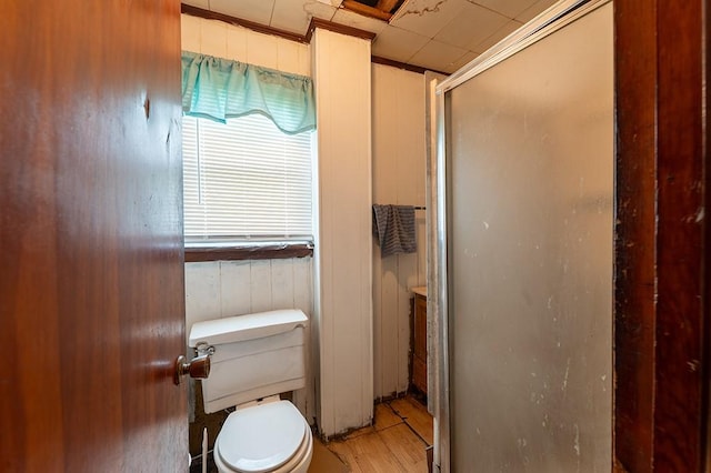 6071 Rte 711, Saint Clair Twp, PA 15944 - bathroom with a stall shower, toilet, and wood finished floors