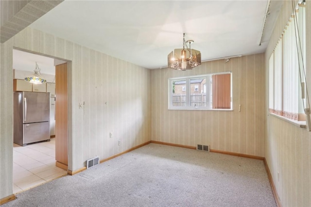 2403 Marion St, Hopewell Twp Bea, PA 15001 - unfurnished room with wallpapered walls, a chandelier, carpet flooring, and baseboards