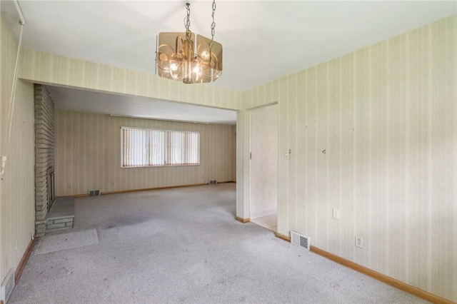 2403 Marion St, Hopewell Twp Bea, PA 15001 - carpeted empty room featuring a chandelier, wallpapered walls, and baseboards