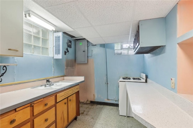 2403 Marion St, Hopewell Twp Bea, PA 15001 - kitchen with a sink, white gas stove, a paneled ceiling, light countertops, and electric panel