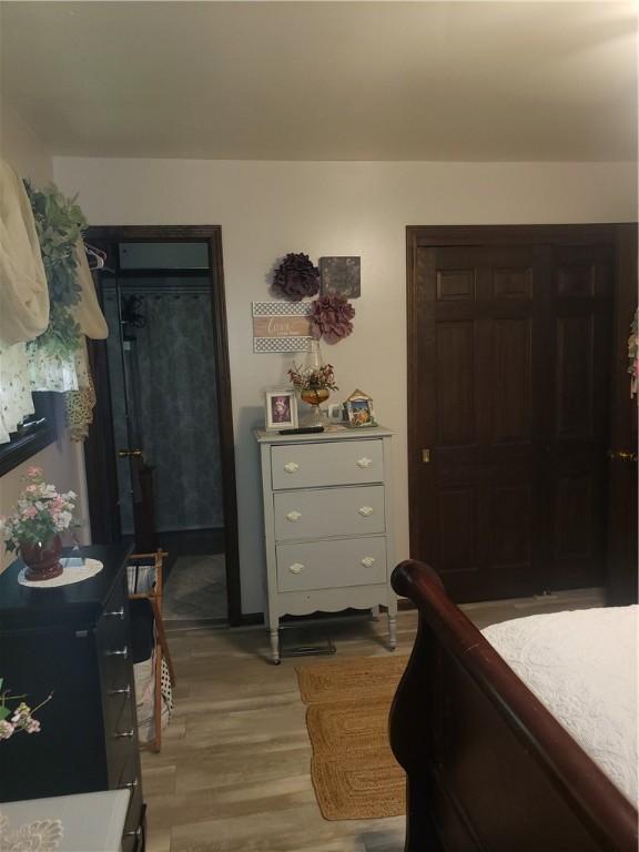 2381 Lake Rd, Jefferson Twp Mer, PA 16150 - bedroom with light wood-type flooring