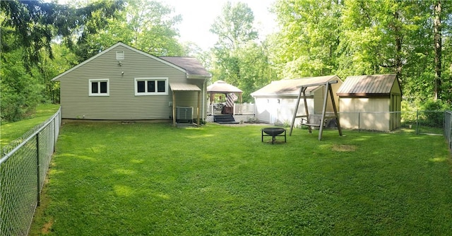 2381 Lake Rd, Jefferson Twp Mer, PA 16150 - back of house featuring a gazebo, a fire pit, and central air condition unit