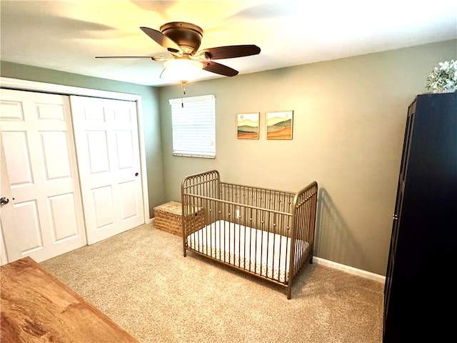 815 Semple Ave, Avalon, PA 15202 - bedroom featuring carpet floors, a crib, a closet, and a ceiling fan