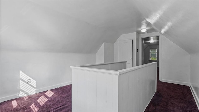 427 W Warrington Ave, Beltzhoover, PA 15210 - bonus room featuring dark carpet, vaulted ceiling, and baseboards