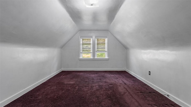 427 W Warrington Ave, Beltzhoover, PA 15210 - bonus room with dark carpet, vaulted ceiling, and baseboards