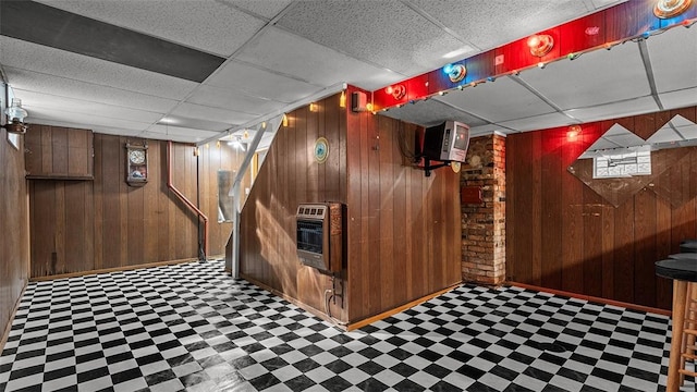 427 W Warrington Ave, Beltzhoover, PA 15210 - building lobby with heating unit, wood walls, and a drop ceiling