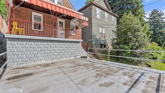 427 W Warrington Ave, Beltzhoover, PA 15210 - back of property featuring brick siding