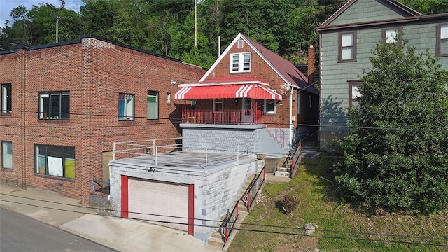 427 W Warrington Ave, Beltzhoover, PA 15210 - view of front of house with brick siding