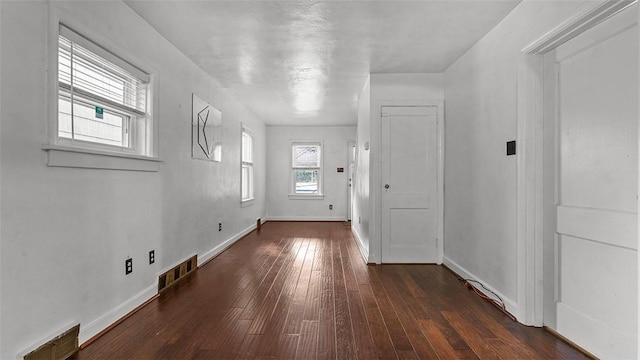 427 W Warrington Ave, Beltzhoover, PA 15210 - entrance foyer featuring dark wood-type flooring and baseboards