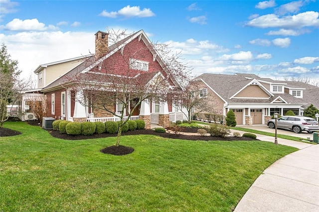 240 Berkeley Way, Monroeville, PA 15146 - view of front of house featuring a porch, a front yard, concrete driveway, and a chimney