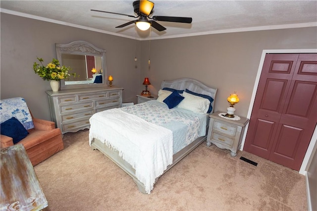 545 Roseland Ave, Ross Twp, PA 15214 - carpeted bedroom with ornamental molding, ceiling fan, and a closet