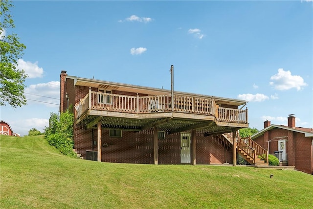 137 Terry Ln, Center Twp Bea, PA 15061 - rear view of property with stairs, a deck, and a lawn