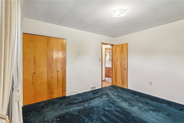 137 Terry Ln, Center Twp Bea, PA 15061 - unfurnished bedroom featuring carpet flooring, baseboards, and a closet