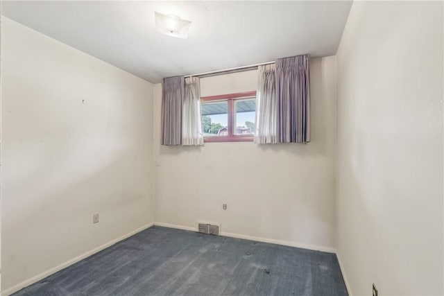 137 Terry Ln, Center Twp Bea, PA 15061 - spare room with baseboards and dark colored carpet