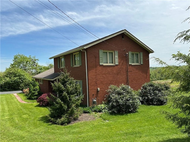 141 Mar Vel Dr, Center Twp But, PA 16001 - view of side of property featuring brick siding and a lawn