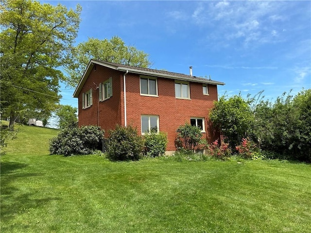 141 Mar Vel Dr, Center Twp But, PA 16001 - back of house featuring a yard and brick siding
