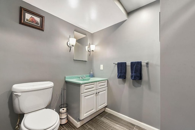 932 Woodbine St, Stanton Heights, PA 15201 - bathroom with toilet, baseboards, and vanity