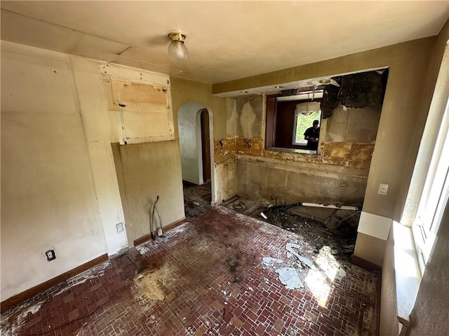 2905 Blackridge Ave, Penn Hills, PA 15235 - unfurnished room with arched walkways and brick patterned floors