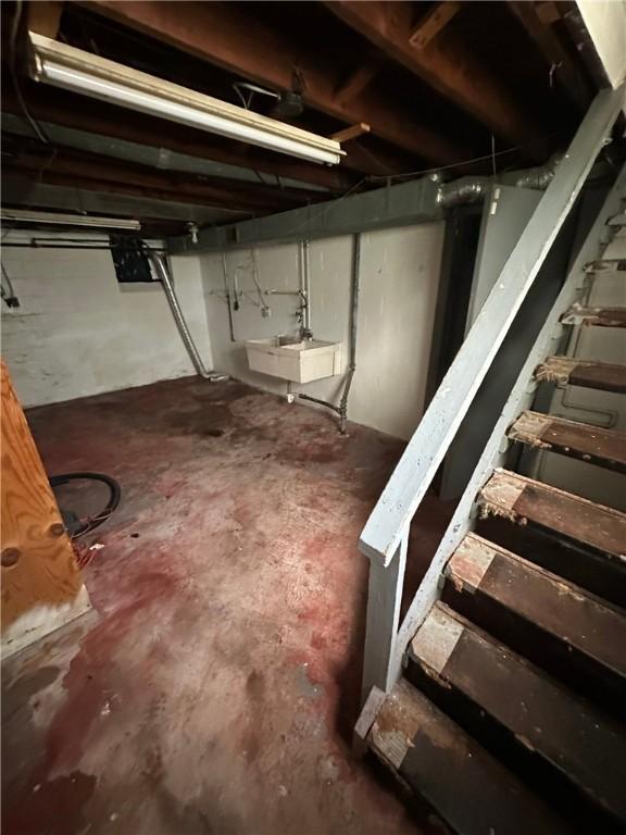 2905 Blackridge Ave, Penn Hills, PA 15235 - unfinished below grade area featuring stairs and a sink