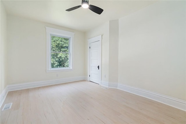 5415 Black St, East Liberty, PA 15206 - empty room with light wood-type flooring, a ceiling fan, and baseboards