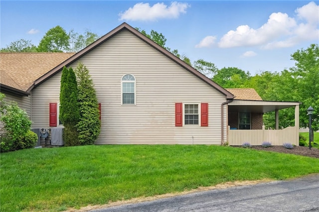 146 Barrington Dr, Collier Twp, PA 15071 - view of property exterior featuring roof with shingles and a lawn