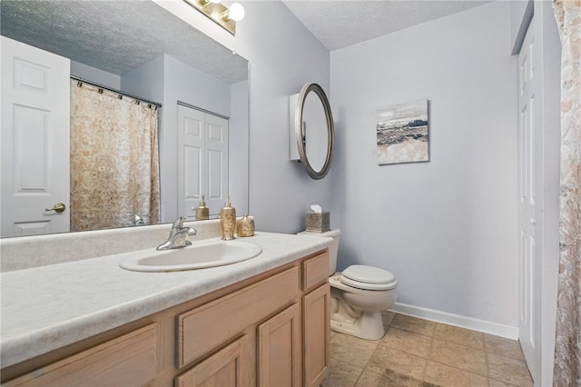 146 Barrington Dr, Collier Twp, PA 15071 - bathroom with baseboards, toilet, vanity, and a textured ceiling