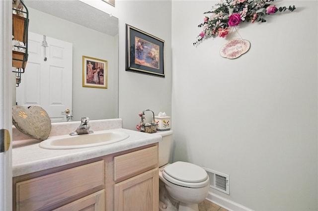 146 Barrington Dr, Collier Twp, PA 15071 - half bath with toilet, vanity, tile patterned floors, and baseboards