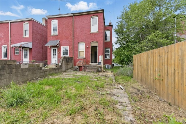 3318 Juliet St, Oakland, PA 15213 - rear view of house featuring brick siding and central AC unit
