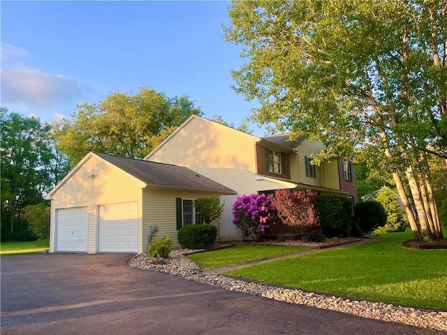 101 Pheasant Run Dr, Worth Twp But, PA 16057 - view of front of home with a front yard and an attached garage