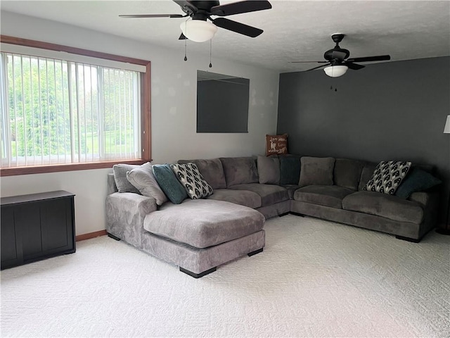 101 Pheasant Run Dr, Worth Twp But, PA 16057 - carpeted living area featuring ceiling fan and baseboards
